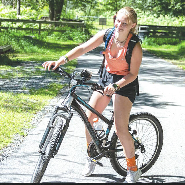 128062867_web1_biking-copy
Laynie Buli started her pursuit of becoming the Leukemia and Lymphoma Society Student of the Year in September with a bike fundraiser, which raised about $1,000.
Submitted photo