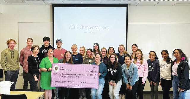 129581623_web1_Symposium-Check-Presentation
The University of Scranton ACHE chapter presented the Northeast Regional Cancer Institute with a $1,000 from their fundraising efforts. Pictured are: First row, from left: Karen Saunders, President, Northeast Regional Cancer Institute, Amanda Marchegiani, Community Relations Coordinator, Northeast Regional Cancer Institute, Sarah Slusark, Samantha Bobinkski, Jill Bautista, Gabrielle Manzella, Lavanya Roy, Mia Zaloga, Bansari Patel, Lalitha Reddy Vidavaluru and Lensa Keno. Second row: Liam Mead, John McCane, Daniel Gendimenico, Ryan Fitzmaurice, Scarlet Alexander, Gianna Dominick, Shannon Stoddard, Chloe Guerra, Rebecca Reynolds and Abigail Lynott.