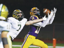 
			
				                                Wyoming Area senior Damian Lefkoski (7) gets his hand in to break up a pass intended for Scranton Preps Brady Holmes (11).
                                 Tony Callaio | For Abington Journal 

			
		