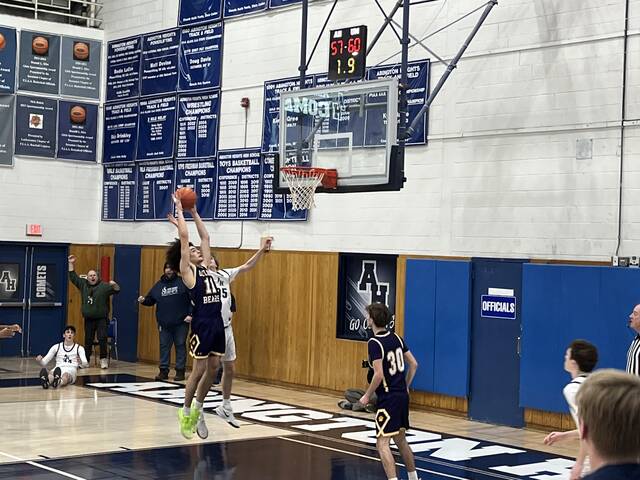 131349010_web1_IMG_4763
Abington Heights still had a shot in its first-round state playoff game until Upper Morelands Larry Hughes cleared the games final rebound with less than two seconds left.
Tom Robinson | For Abington Journal