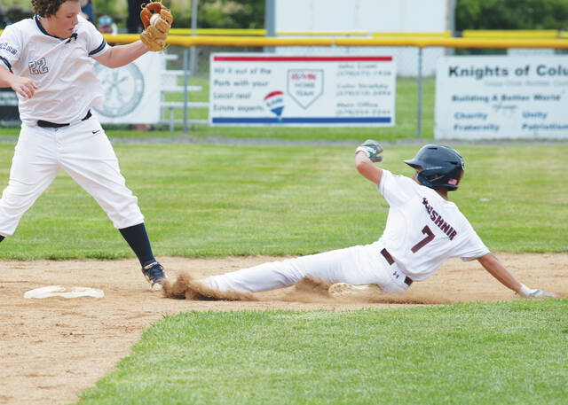 131652790_web1_250716akffll--11-of-13-
Kingston/Forty Forts Kye Kushnir slides in safely at second base before Abington shortstop Max Vazquez could apply the tag.
Buck Norton-Jennings | For Times Leader