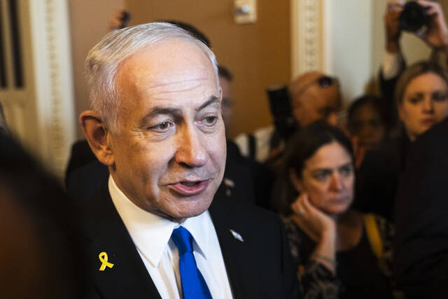 131671678_web1_131671678-91b21ff01d0e4572ba67637f9a4dbefa
Israeli Prime Minister Benjamin Netanyahu, speaks to reporters before a meeting with lawmakers at the Capitol in Washington, Wednesday, July 9.
AP Photo