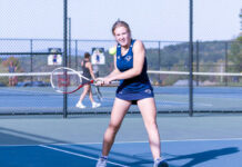 
			
				                                Comet Caroline Henderson returns a serve in doubles action on Sept. 30 in Newton Twp.
                                 Buck Norton Jennings | For Abington Journal

			
		