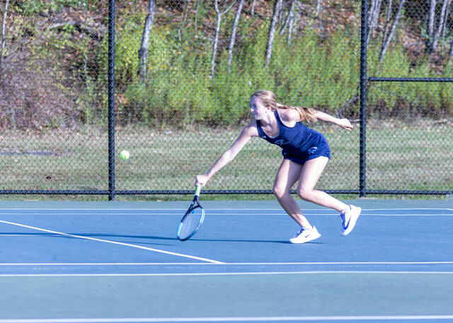 <p>Comet Elsie Phillips rushes to return a shallow shot by her Western Wayne opponent.</p>
<p>Buck Norton Jennings | For Abington Journal</p>