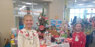 
			
				                                Aly Boccella, left, and her sister Lexy with their stand of handcrafted items.
                                 Submitted Photo

			
		