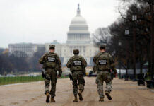 
			
				                                National Guard patrol along the National Mall in front of the Capitol on Wednesday in Washington.
                                 AP Photo

			
		
