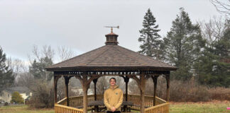 
			
				                                Eagle Scout James Mitchell stands in front of the renovated pavilion in the park at Carol Drive.
                                 Submitted Photo

			
		