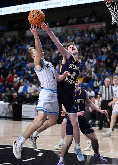 <p>Brody Martin (2), of Scranton Prep, blocks the shot of Dallas’ Joey Nocito (1) in first-half action at Mohegan Sun Arena.</p>
<p>Tony Callaio | For Abington Journal</p>