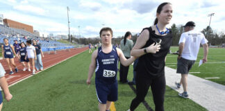 
			
				                                Jacob Butler is escorted to the team meeting.
                                 Mark Moran | For Abington Journal

			
		
