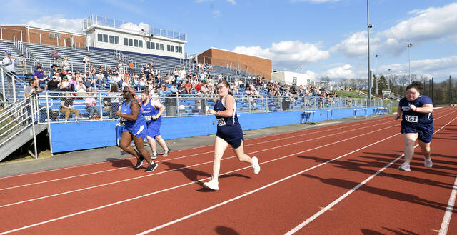 <p>Maddie Rowlands runs in the 100-meter dash.</p>
<p>Mark Moran | For Abington Journal</p>