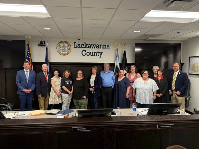 132312174_web1_2026-Library-Week-Pix
The Lackawanna County Commissioners designated April 19 through 25 as National Library Week and presented a proclamation to members of the countys library system. These institutions serve as vibrant hubs to connect people with knowledge, technology, and resources for cultural enrichment, civic engagement, training, career growth, and more in a welcoming and creative atmosphere. From left: Commissioner Bill Gaughan; Commissioner Thom Welby; Allyson Wind, Abington Community Library executive director; Joy Monroe, North Pocono Public Library executive director; Sandy Longo, Lackawanna County Library System executive director; Maureen Brennan, Lackawanna County Library System board member; Scott Thomas, Scranton Public Library CEO; Stephanie Spaid, Carbondale Public Library executive director; Briana Cimino, Taylor Community Library executive director; Kristen Wallo, Valley Community Library executive director; Betsy Bonczar, Dalton Community Library board member; Shu Qiu, Dalton Community Library executive director; and Commissioner Chris Chermak.
Submitted Photo