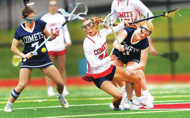 <p>Crestwood midfielder Jordan Andrews and Abington Heights attacker Morgan Davis collide going for the ball in the first quarter.</p>
<p>Fred Adams | For Abington Journal</p>