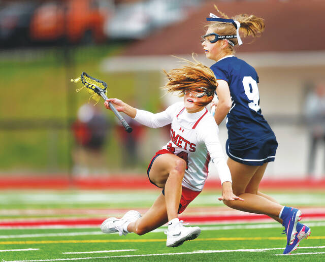 132315783_web1_ab_cr2_faa
Crestwood midfielder Jordan Andrews leans into Abington Heights midfielder Brooklyn Yankow in the first quarter, advancing the ball.
Fred Adams | For Abington Journal