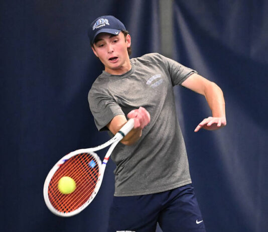 
			
				                                Wyoming Seminarys Billy Hall in action against Holy Crosss Alex Harrison in the finals of the District 2 Class 2A boys tennis singles tournament. Hall beat Harrison in straight sets to win the gold.
                                 Tony Callaio | For Times Leader

			
		