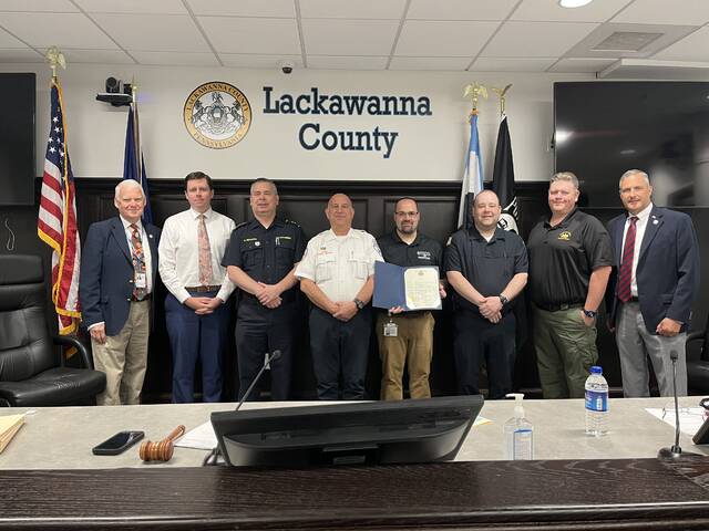 132381737_web1_Emergency-Medical-Services-Week-Pix-
Lackawanna County officials recognized EMS Week, the third week of May. Emergency Medical Service personnel are everyday heroes. First responders are on the job 24 hours a day, seven days a week, providing lifesaving care and assistance to individuals who experience sudden illness, serious injuries, or traumatic events. The work performed by nurses, doctors, firefighters, law enforcement, dispatchers, and others is the culmination of several hours of training and education focused on the goal of saving lives. From left: Commissioner Thom Welby, Commissioner Bill Gaughan, Bruce Beauvais, Pennsylvania Ambulance; Steve Fish, Cottage Ambulance Company; Robert Carpenter, EMSNP of Northeast; Michael Chimielewski, Covington Ambulance; Tom Taylor, Lackawanna County Emergency Management Agency Director; and Commissioner Chris Chermak.
Submitted photo