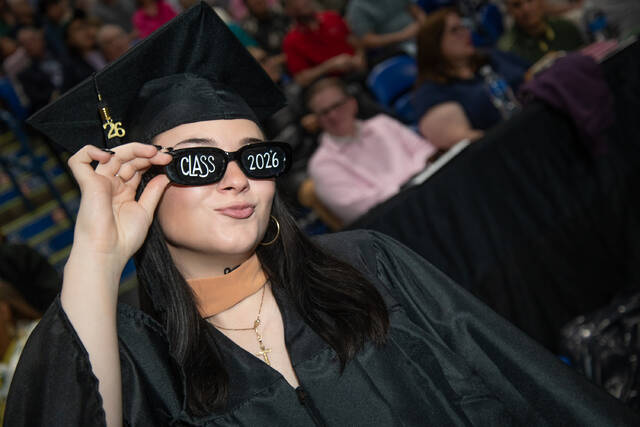 132381799_web1_Grad-with-Shades
One Marywood graduate affirmed that her future is so bright, she had to wear shades
Submitted photo