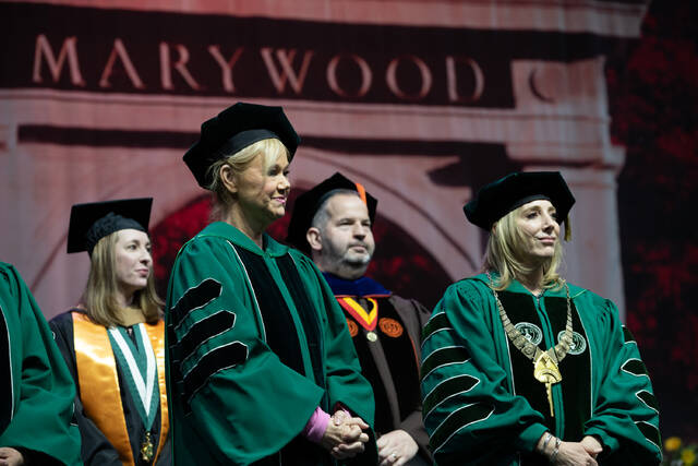 <p>Actress/Comedian Caroline Rhea, left, stands at center stage with Marywood President Lisa A. Lori as she received an honorary doctorate during the ceremony.</p>
<p>Submitted photo</p>