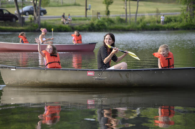 <p>Attendees listen to the music of the July 2, 2014, concert from the lake. Canoes will again be available to borrow at no charge during this year’s Lakeside Wednesday Concerts series.</p>
<p>Abington Journal File Photos</p>